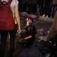 A protester blocks a fire truck from gaining access to the police station
